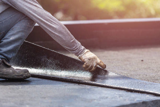 Professional Waterproofing technician working in Kings Park, VA